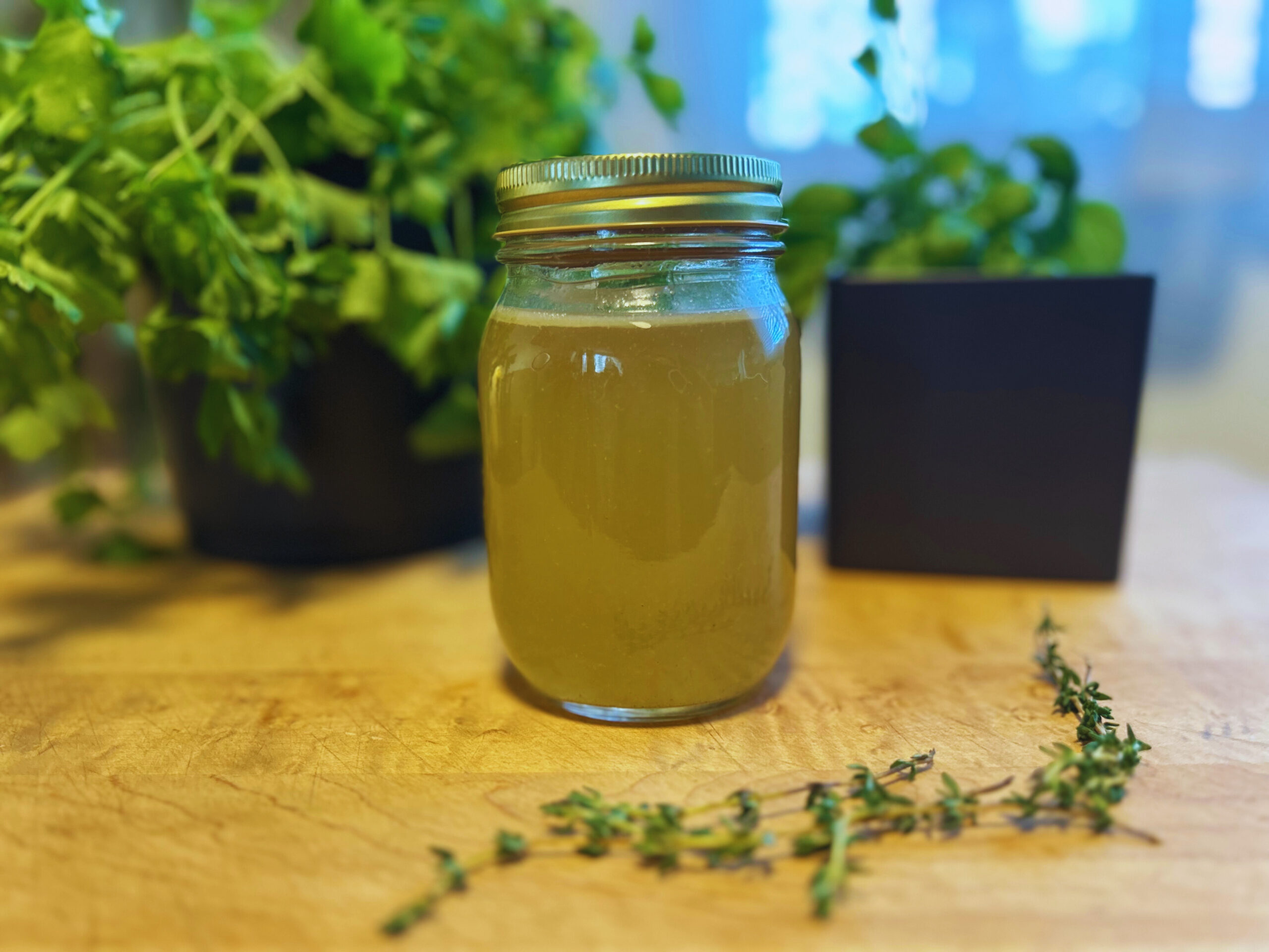 Turkey bone broth in a mason jar